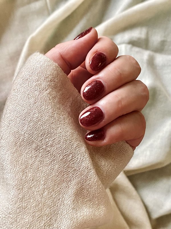 How to Use a Pashmina Scarf to Add a Pop of Color to a Neutral Suit?